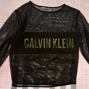 Calvin klein black mesh top
size small 
excellent condition, like new